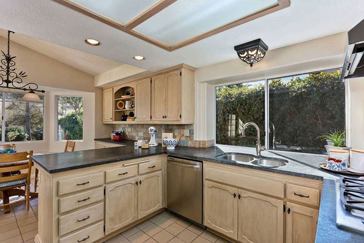 Country kitchen with black pearl granite countertops