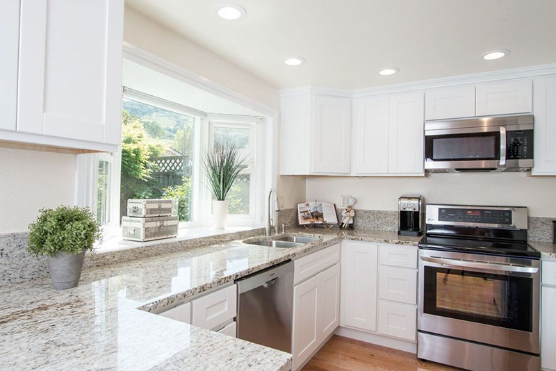 Colonial White Granite With White Cabinets